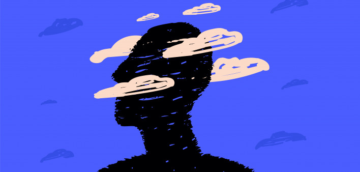 A black silhouette of a head surrounded by clouds, a symbol of postcovid syndrome, brain fog