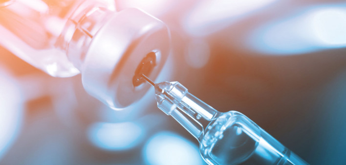 syringe in vial vaccine