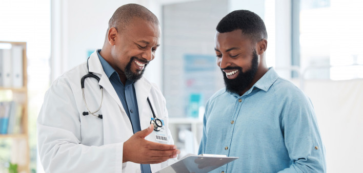 smiling doctor and patient african american