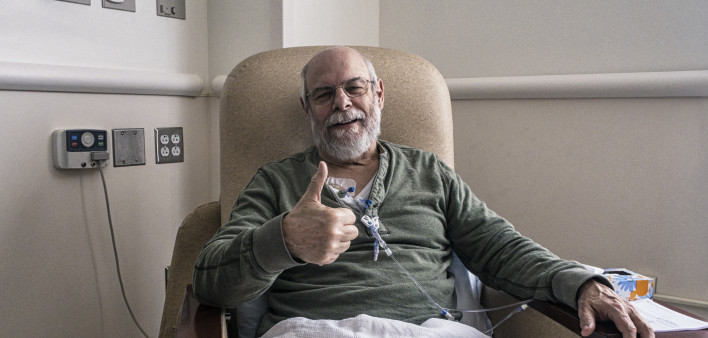 old man with beard giving thumbs up chemo therapy treatment