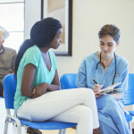Nurse and patient talking in hospital  ER