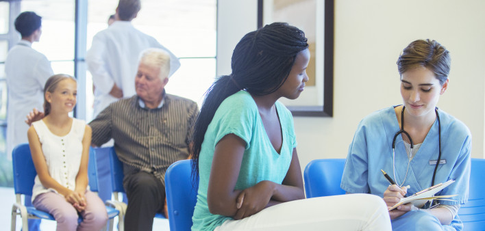 Nurse and patient talking in hospital  ER
