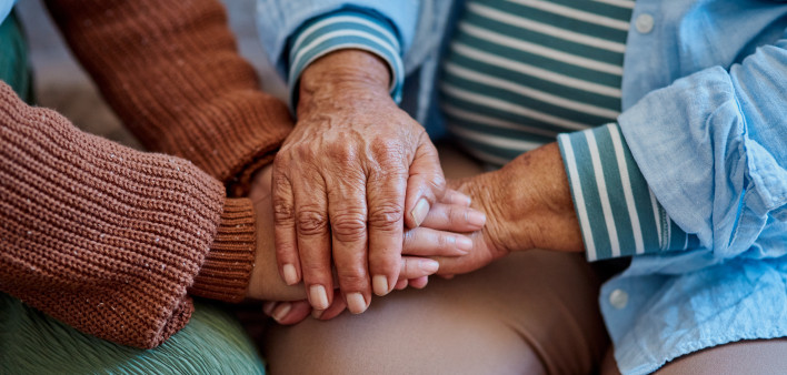 hands together three generations women