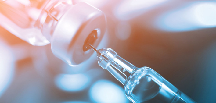 syringe in vial vaccine
