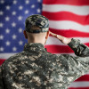 Military US Soldier Saluting Flag. Army Veteran