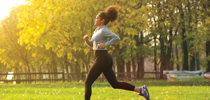 young woman running outdoors