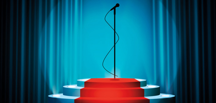 microphone in spotlight center stage