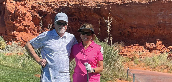 Terry Evans  and his wife play golf in Utah.