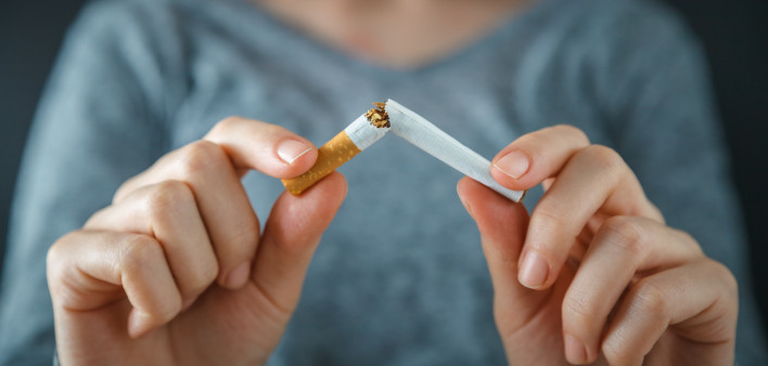 hands break cigarette quite smoking