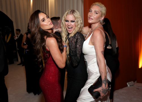From left: Kyle Richards, Avril Lavigne and Kesha attend the Elton John AIDS Foundation's 32nd Annual Academy Awards Viewing Party on March 10, 2024 in West Hollywood, California.