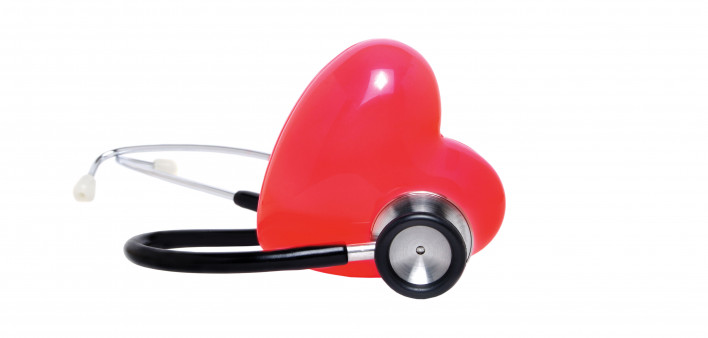plastic heart and stethoscope