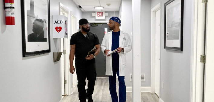 From left: Kareem Alexis, MD, and family nurse practitioner Bernard Royal, MSN, at NAESM’s Total Life Care Center in Atlanta
