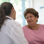 Older Woman talking with the Doctor