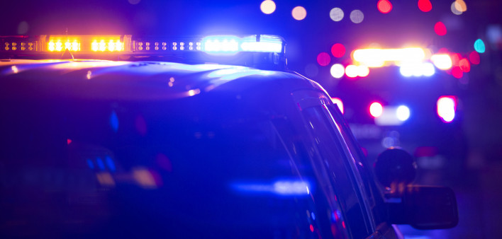 Police units responds to the scene of an emergency. police car police lights