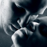 a man and woman about to kiss