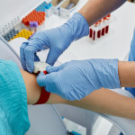 Nurse taking blood for patient analysis in medical laboratory stock photo Blood Test, Medical Test, Women, Tourniquet, Blood