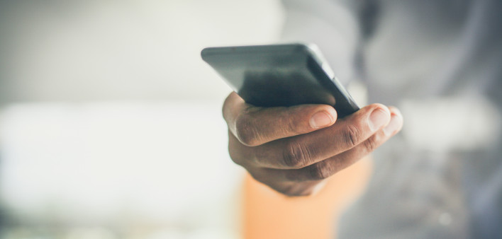 hand holding smart phone