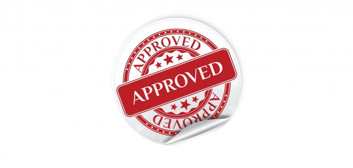 A red and white seal of "Approval"