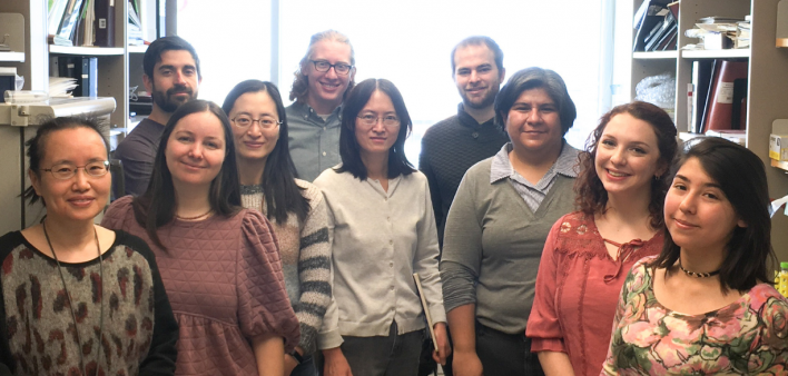 Rui Zhao, PhD (center) and her lab team
