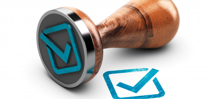 stamp with check mark approved