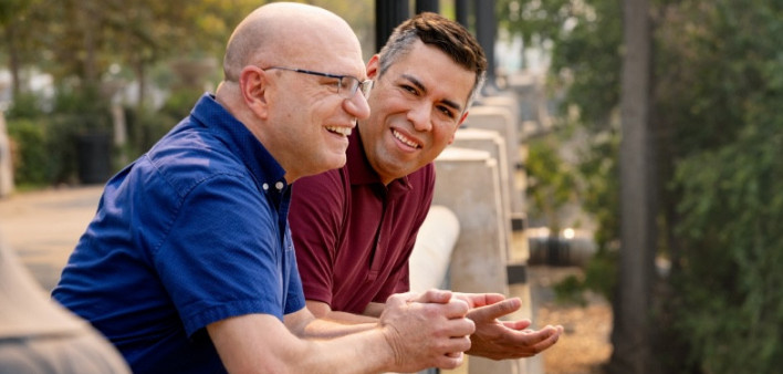 Dennis, a long-term survivor living with multi-drug resistant (MDR) HIV-1, and his partner.