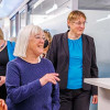 U.S. Sen. Patty Murray (center), visits with senior nurse manager Mitch Mitchell (left) and Dr. Nancy Davidson and staff at the nurses’ station during her visit to the Bezos Family Immunotherapy Clinic at Fred Hutch Cancer Center, on June 27, 2024, in Sea