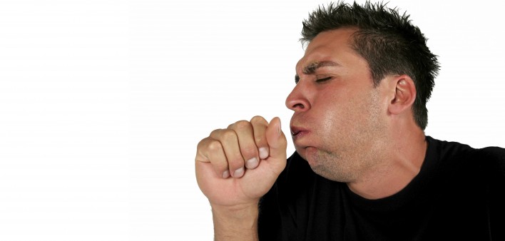 man coughing on white background