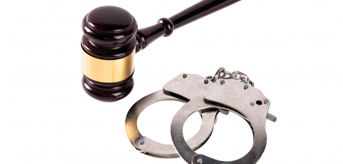gavel and hand cuffs