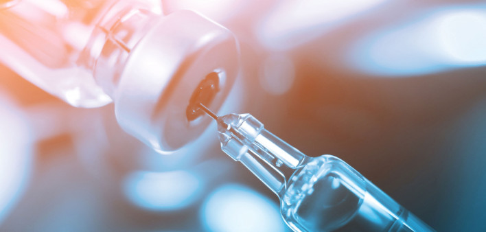 syringe in vial vaccine