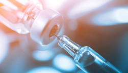 syringe in vial vaccine