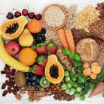 food with high fiber content for a healthy diet with fruit, vegetables, whole wheat bread, pasta, nuts, legumes, grains and cereals