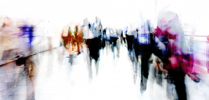 blurred abstrat image of people on city street