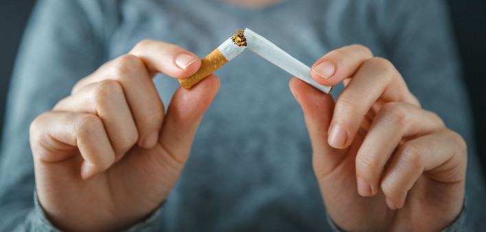 hands break cigarette quite smoking