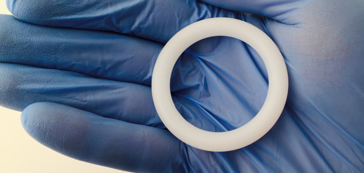 Dapivirine vaginal ring on blue gloved hand