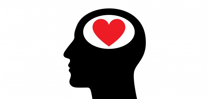 illustration ofheart in the head of mans silhouette