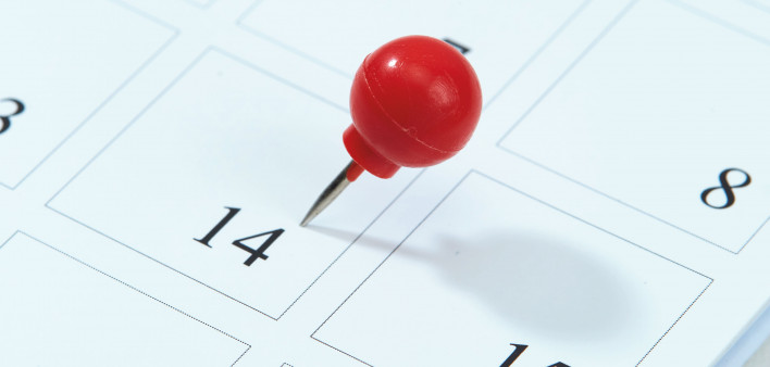 calendar with red pin on 14