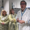 Lobular breast cancer patients tour the pathology lab of Dr. Giuseppe Floris, right, during the 2024 International ILC Symposium in Leuven, Belgium.