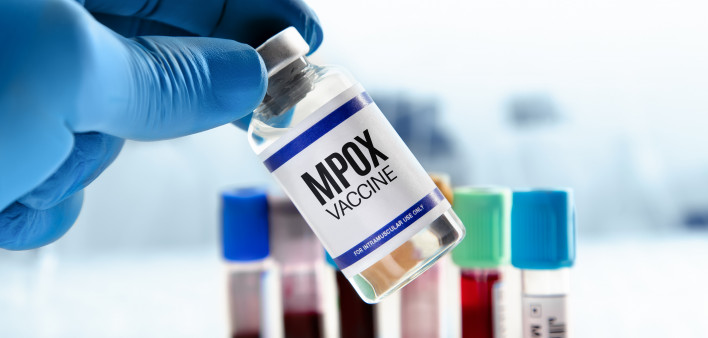 Doctor with vial of the doses vaccine for MPOX monkeypox disease