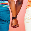 Two men holding hands