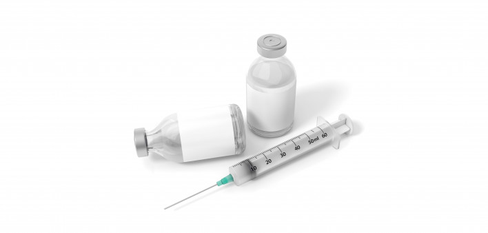 vaccine bottles and syringe