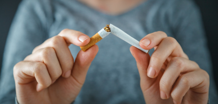 hands break cigarette quite smoking