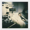This Polaroid photograph from the personal archive of Logan Bellew shows him during his first leukapheresis on March 8, 2019.