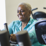 older woman on exercise bike