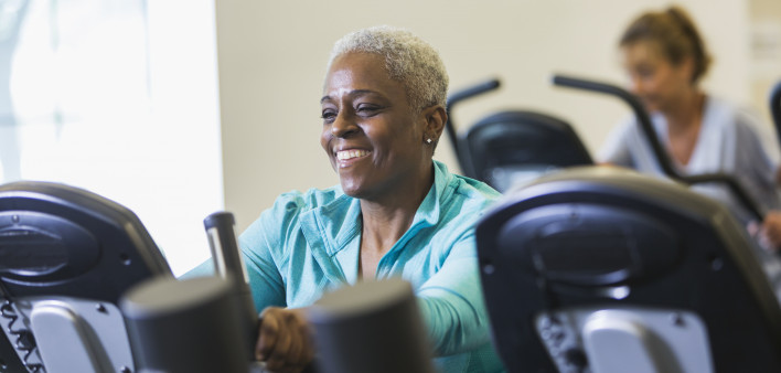 older woman on exercise bike