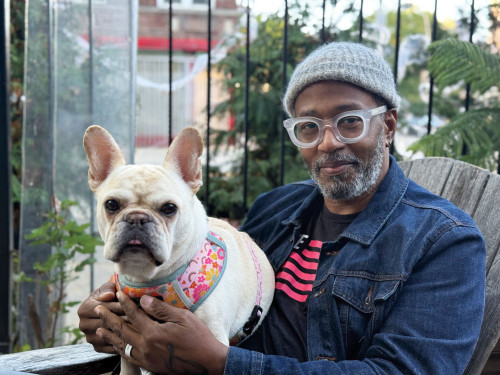 Larry Bryant today with his dog, Button