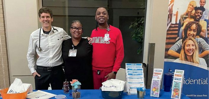 Thomas Dobbs (left) and colleagues representing the University of Mississippi Medical Center at an outreach event