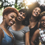 Black women Teenager Girls smiling having fun outdoors