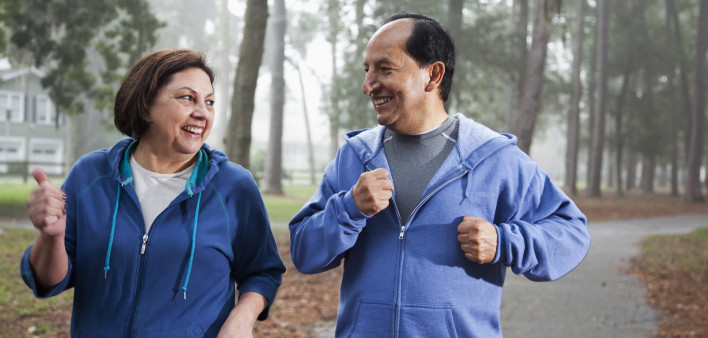 Latino couple jogging