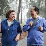 Latino couple jogging