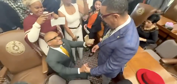Venton Jones, a state lawmaker in Texas who is HIV positive, proposes to his partner, Gregory  Scott Jr., on the floor of the state House on January 14, 2025.